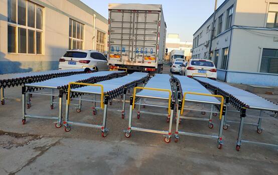 濟(jì)南冷凍食品廠用卸貨輸送機(jī)30米無(wú)動(dòng)力滾筒伸縮線項(xiàng)目